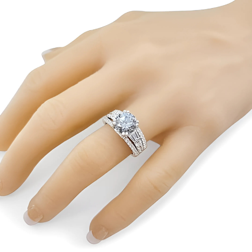 Platinum plated sterling silver ring with baguettes.