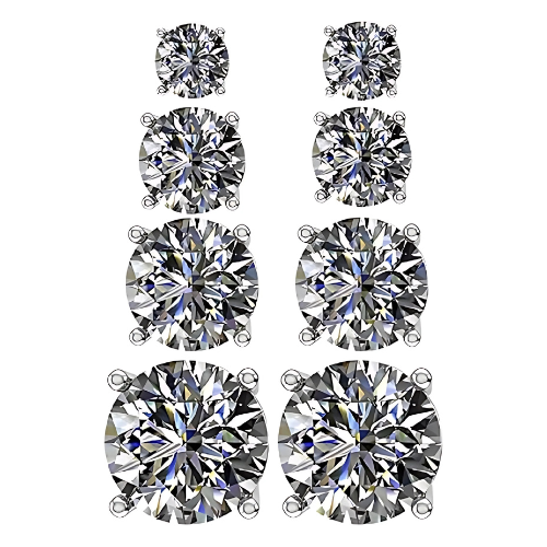 Close-up of four different sized cubic zirconia stud earrings.