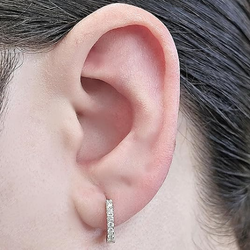 Detail of Pure Brilliance CZ on huggie hoop.