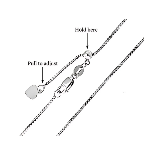 Model wearing sleek black ceramic necklace and earrings.