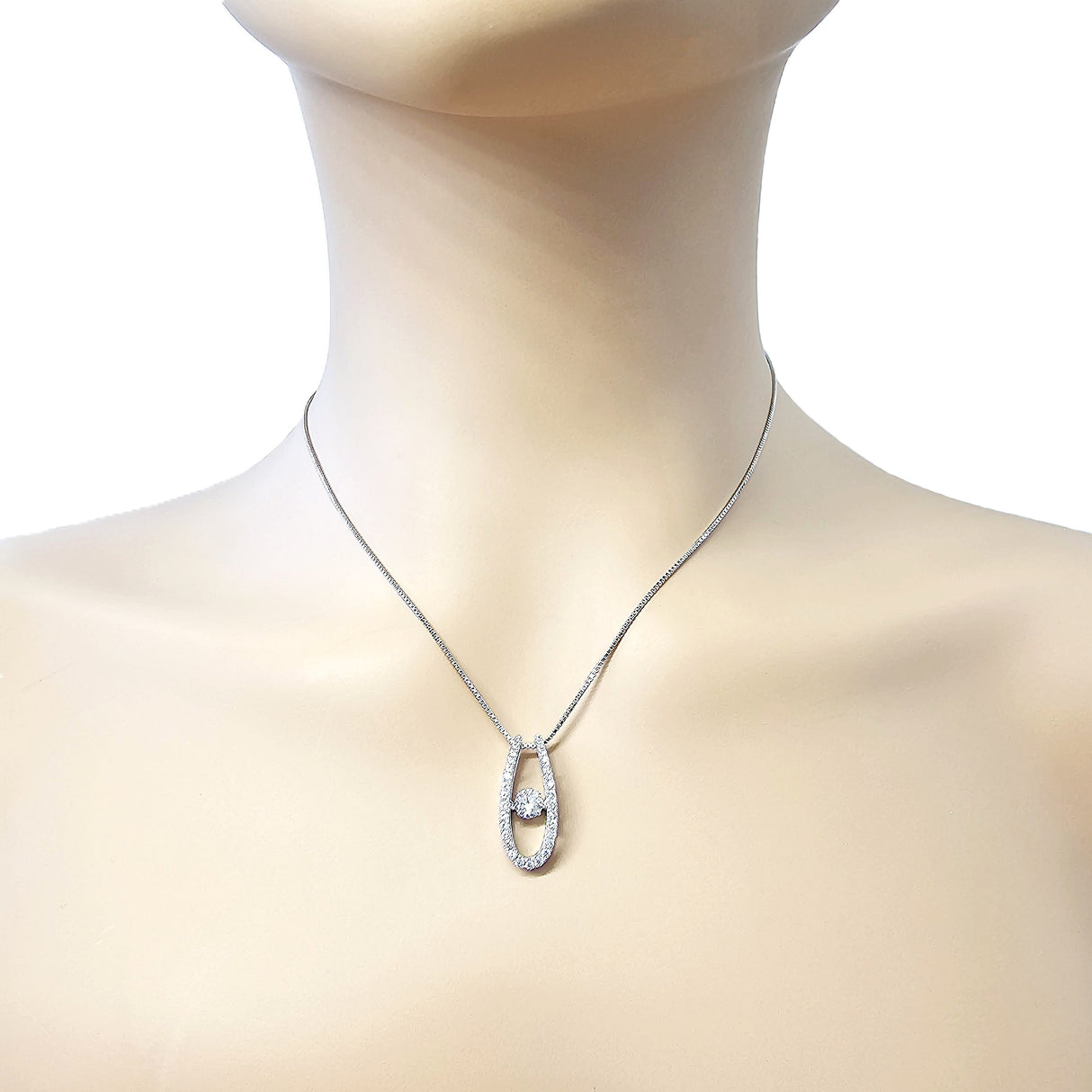 U shape dancing gemstone necklace on display.