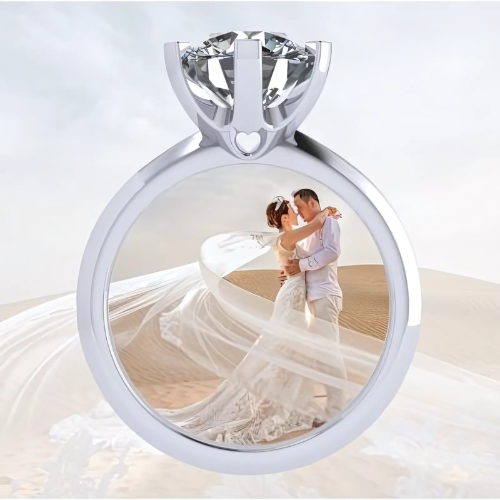 Engagement ring with a 2-carat simulated diamond solitaire on a hand.