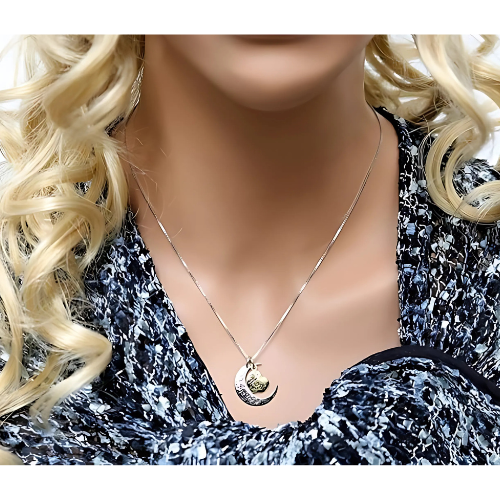 Close-up of "Mom, I Love You To The Moon and Back" pendant.