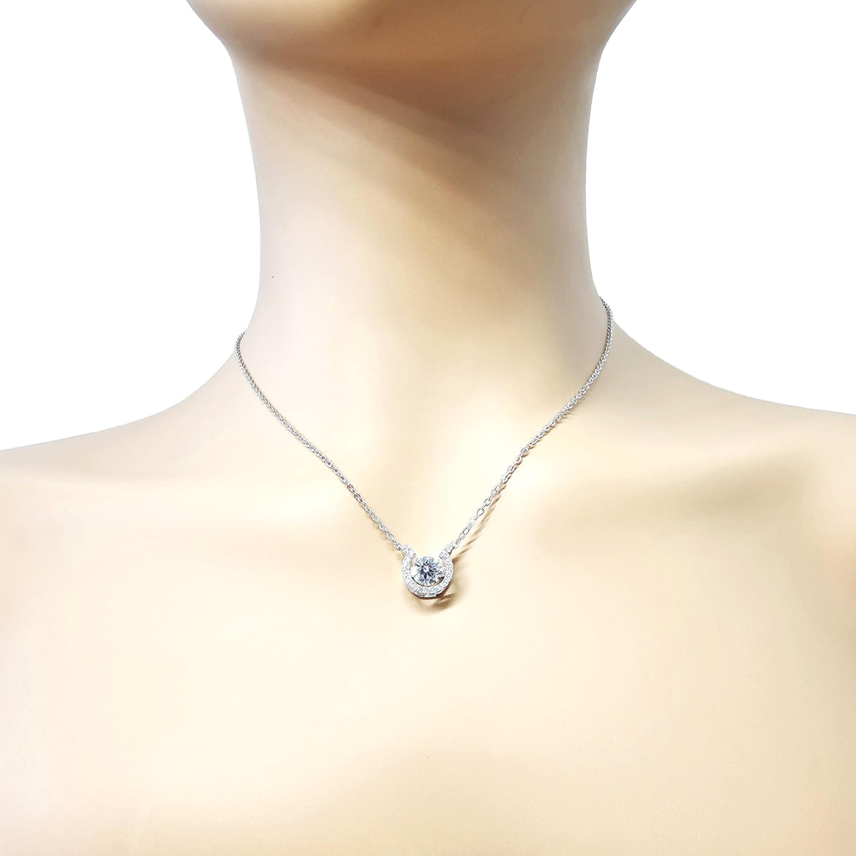 Horseshoe dancing gemstone necklace on display.