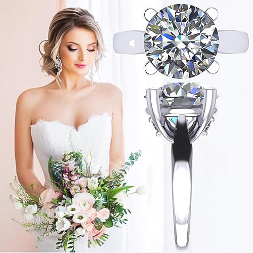 Silver engagement ring with a round cut simulated diamond