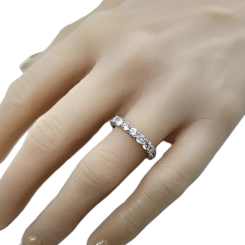 Close-up shot of the simulated diamond shared prong ring.