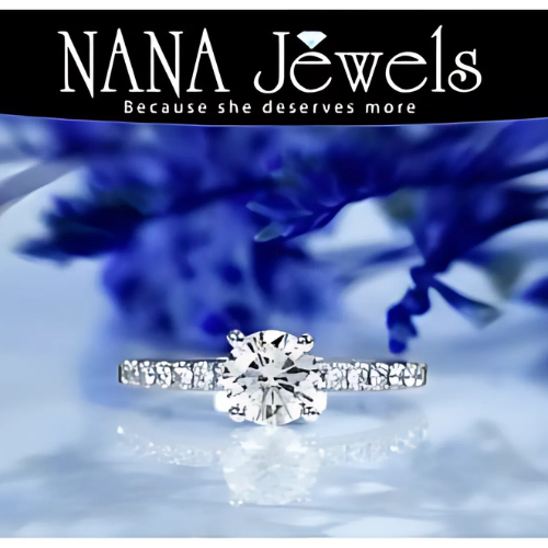 Model wearing a sterling silver solitaire engagement ring.