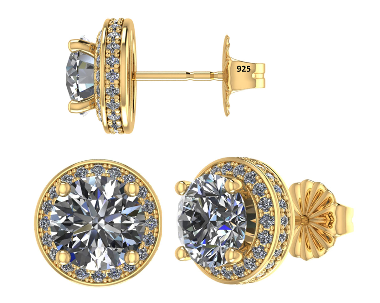 Sterling silver round halo stud earrings featuring pure brilliance zirconia.