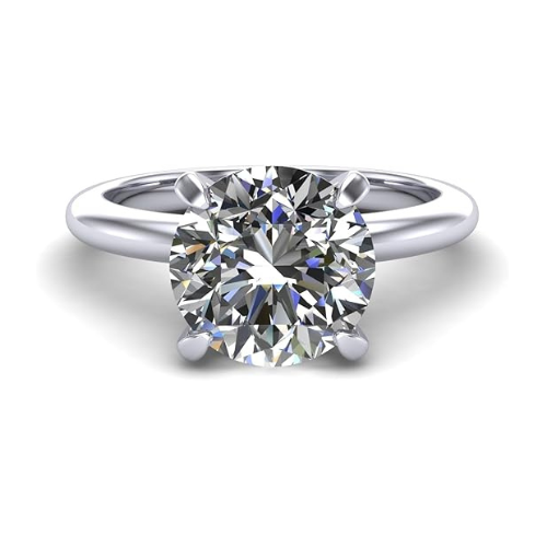 Simulated diamond solitaire engagement ring close-up.