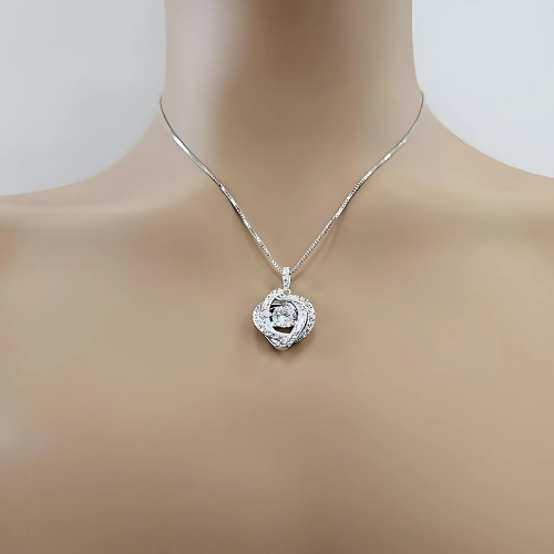 Pure Brilliance Zirconia in a swirling silver setting.