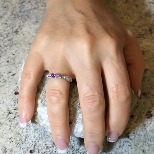 Front view of a princess cut two-stone ring.
