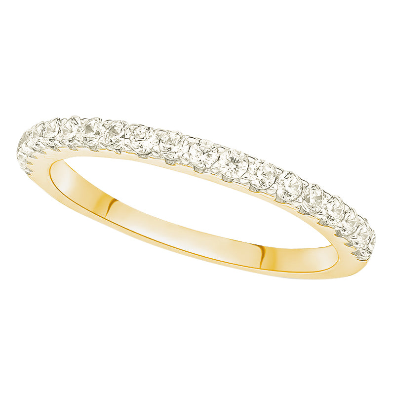 Stackable CZ ring in solid 10K gold worn with an engagement ring.