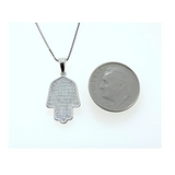 Close-up of the halo hamsa pendant with simulated diamonds.