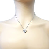 Circle in Heart dancing gemstone necklace on display.