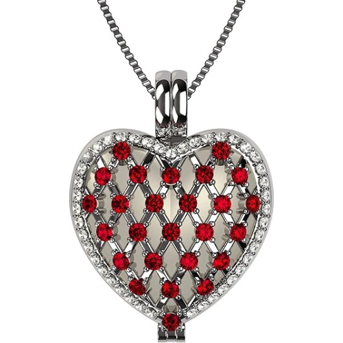 Sterling silver heart locket with mother of pearl.