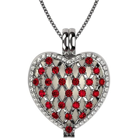 Sterling silver heart locket with mother of pearl.