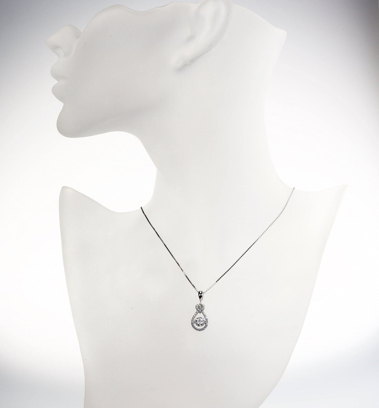 Model wearing Sterling Silver Heart Pear Dancing Necklace.