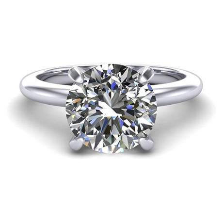 Elegant VOGUE solitaire ring on display.